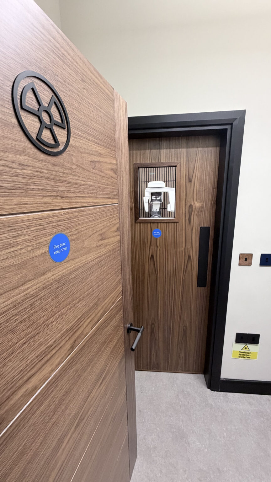 Leaded X-ray door to the CBCT scanning room at Octagon House